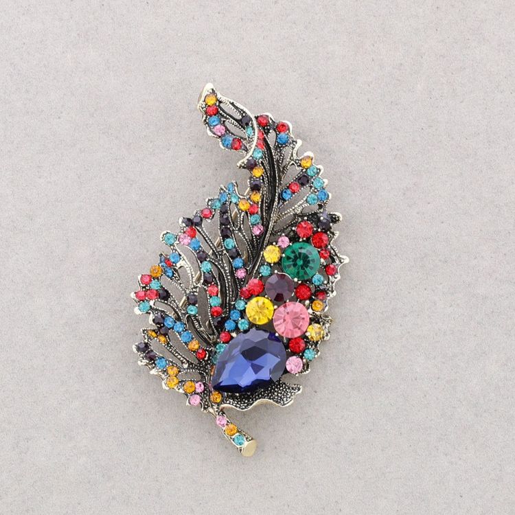 BROCHE HOJA METAL CRISTALES