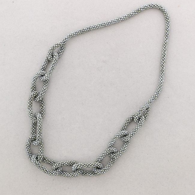 LONG NECKLACE WITH FACETED CRYSTALS LINKS