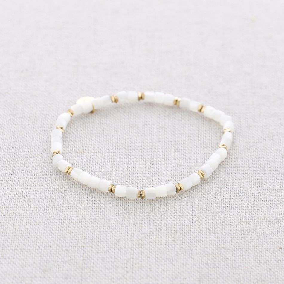 STEEL ELASTIC BRACELET WITH NACRE BEADS