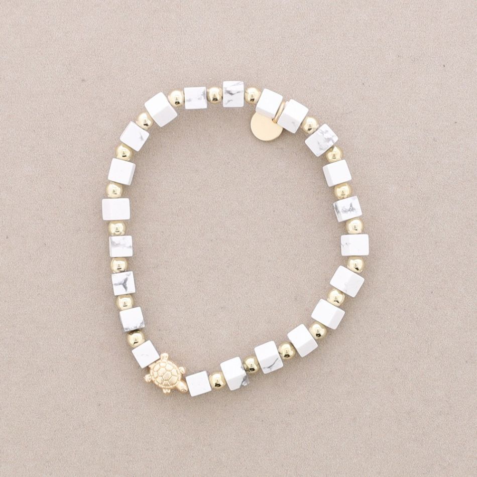 PULSERA ELÁSTICA PIEDRAS CUADRADAS TORTUGUITA METAL