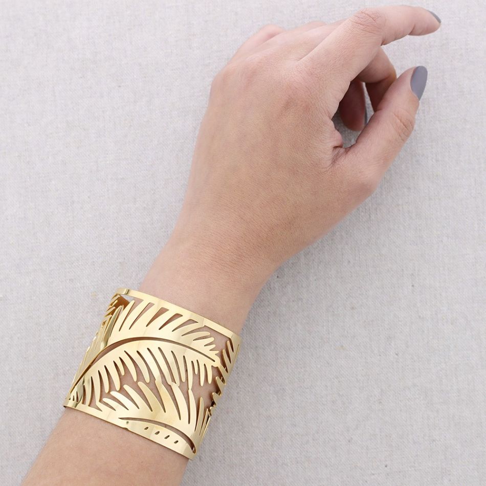 ADJUSTABLE STEEL BRACELET WITH OPENWORK LEAVES