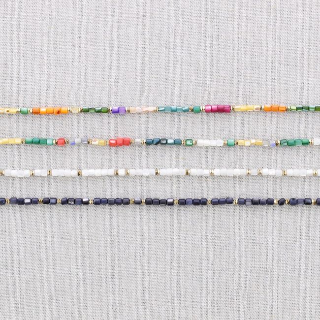 THREE ROUND STEEL BRACELET WITH NACRE BEADS