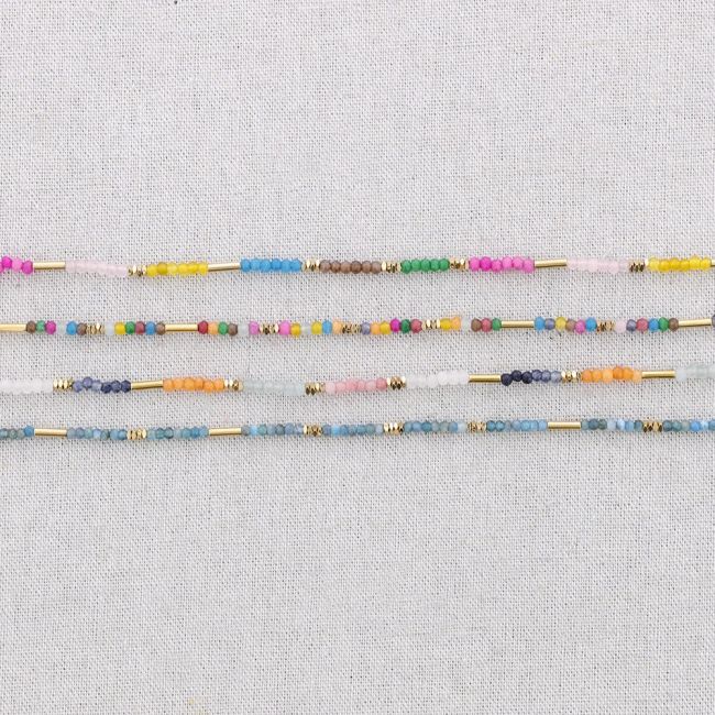 STEEL NECKLACE WITH COLORED FACETED STONES
