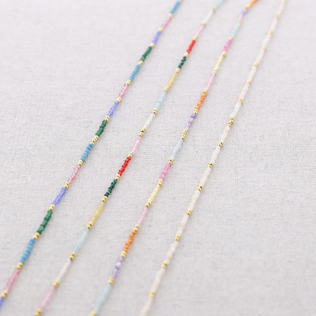 THREE TURNS STEEL BRACELET WITH FACETED STONES