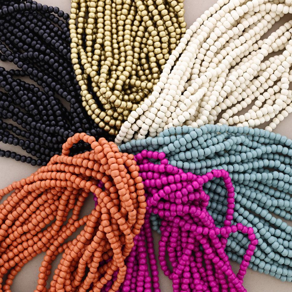 LONG NECKLACE WITH SEVEN STRIPS WOODEN BALLS
