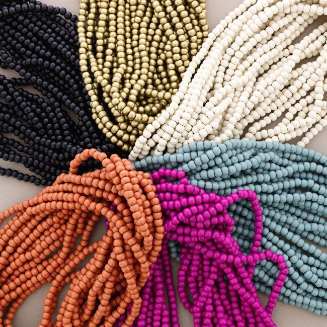 LONG NECKLACE WITH SEVEN STRIPS WOODEN BALLS
