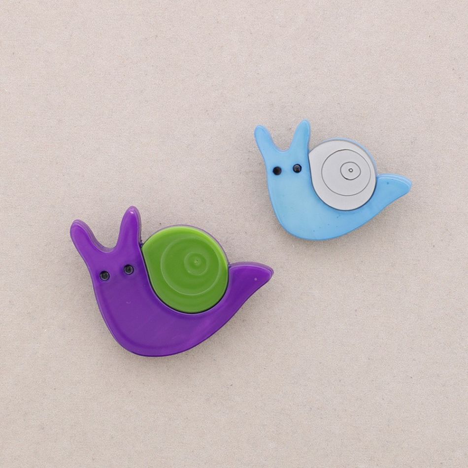 BROCHE SET 2 CARACOL RESINA