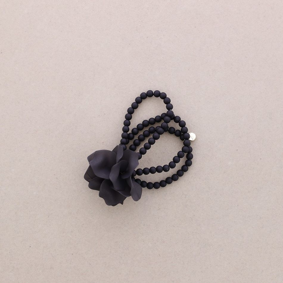 PULSERA ELÁSTICA BOLITAS FLOR RESINA