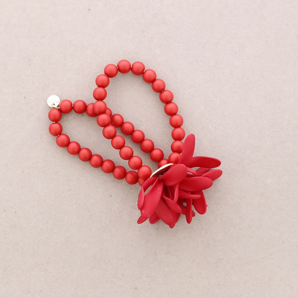 PULSERA ELÁSTICA BOLITAS FLOR RESINA
