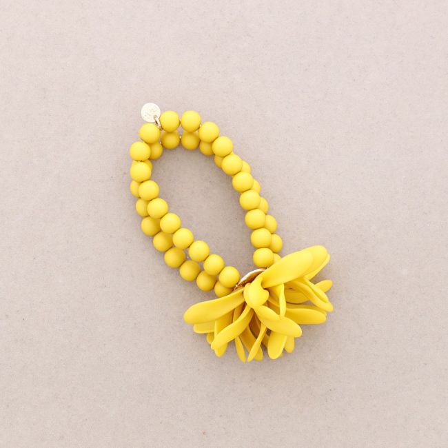 PULSERA ELÁSTICA BOLITAS FLOR RESINA