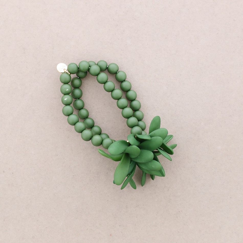 PULSERA ELÁSTICA BOLITAS FLOR RESINA