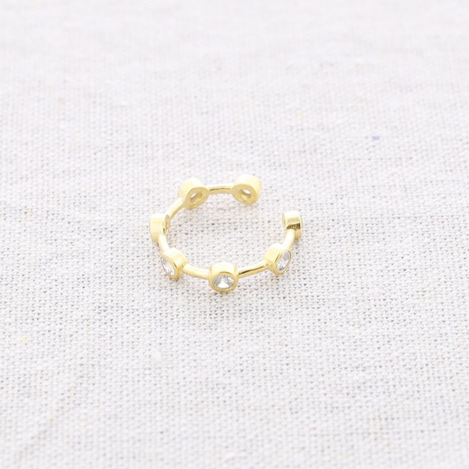 BRONZE RING WITH SEVEN ZIRCONS