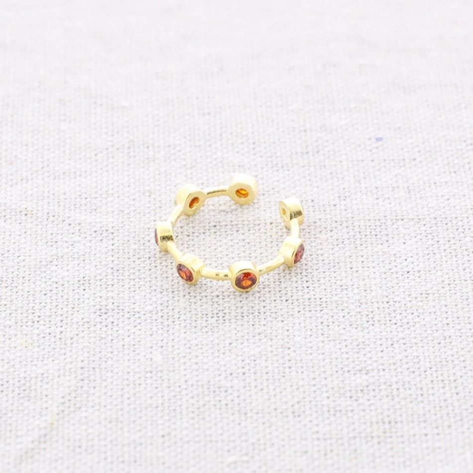 BRONZE RING WITH SEVEN ZIRCONS