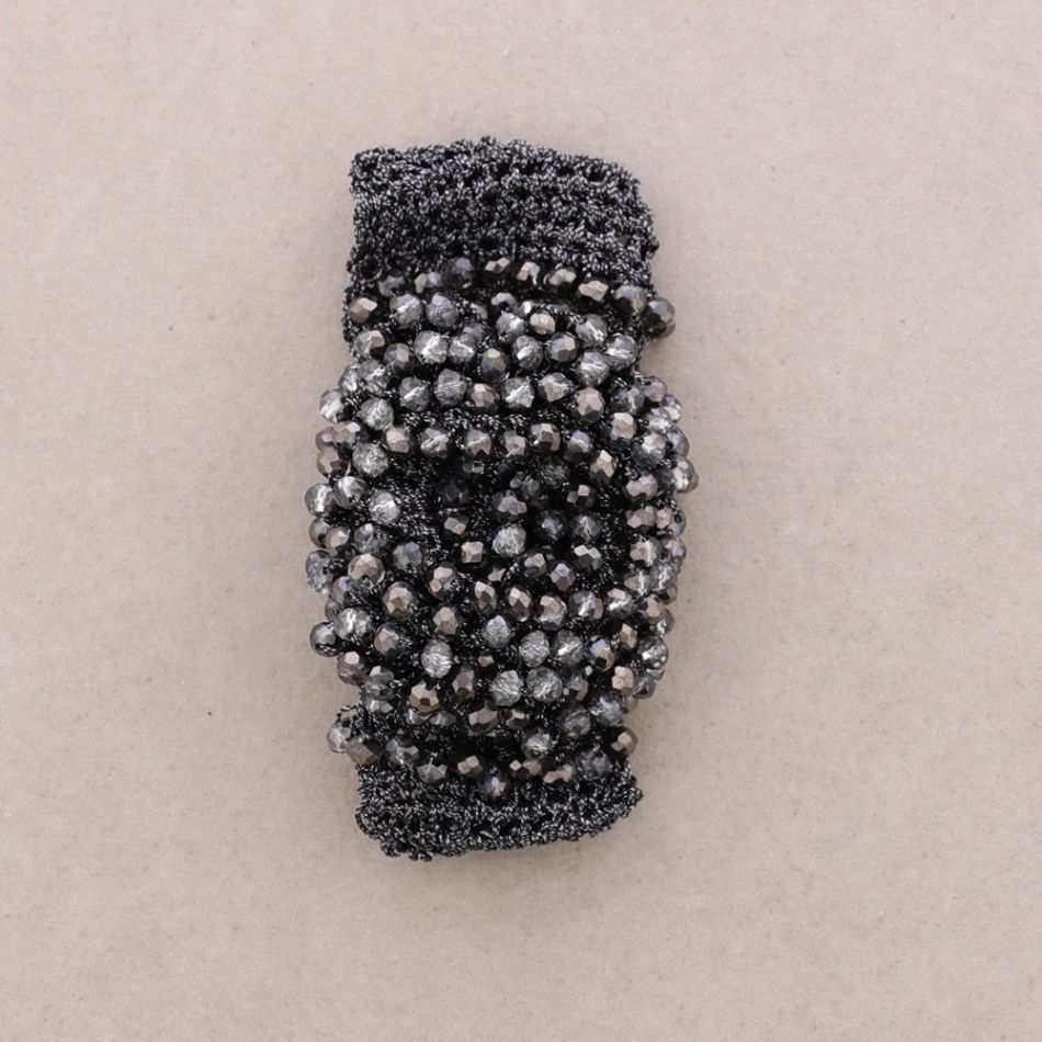 WOVEN BRACELET WITH FACETED CRYSTALS