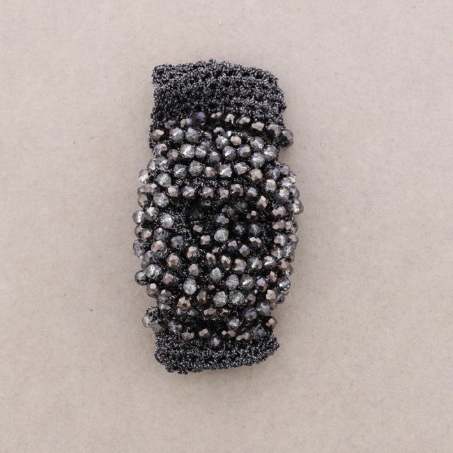 WOVEN BRACELET WITH FACETED CRYSTALS