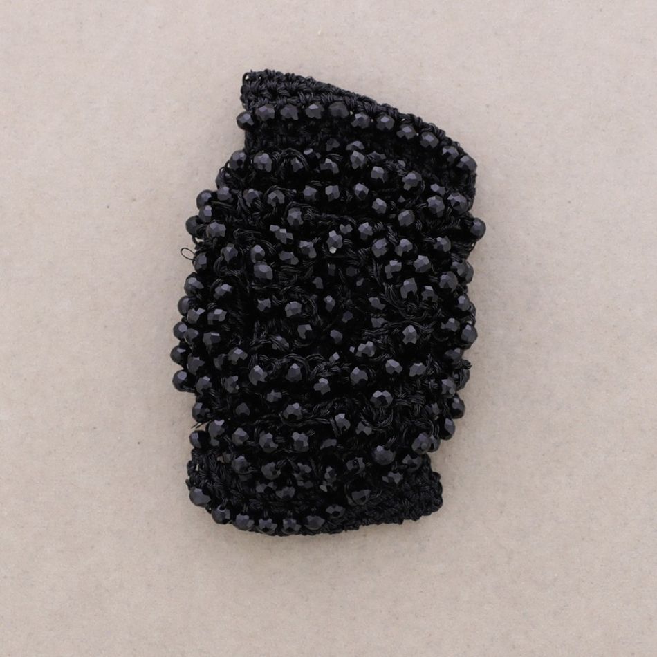 WOVEN BRACELET WITH FACETED CRYSTALS