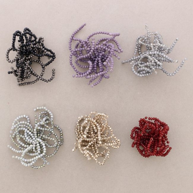 ADJUSTABLE FLOWER BROOCH WITH FACETED CRYSTALS