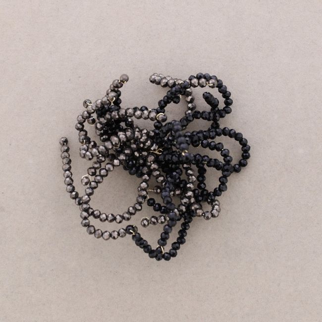 ADJUSTABLE FLOWER BROOCH WITH FACETED CRYSTALS