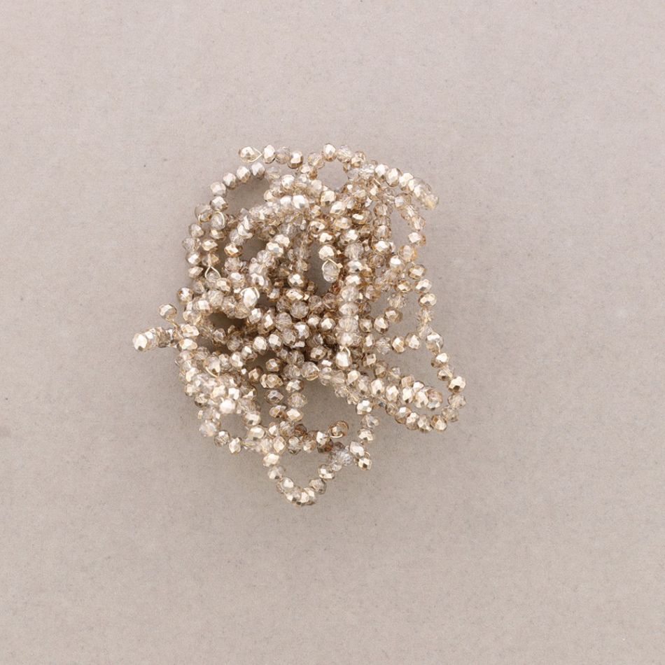 ADJUSTABLE FLOWER BROOCH WITH FACETED CRYSTALS