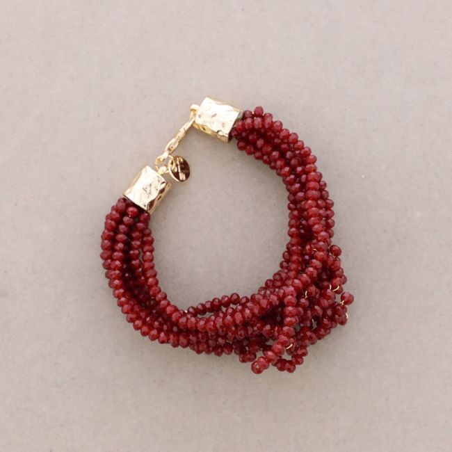 ADJUSTABLE FLOWER BRACELET WITH FACETED CRYSTALS