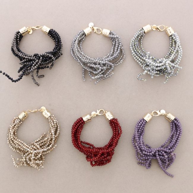 ADJUSTABLE FLOWER BRACELET WITH FACETED CRYSTALS