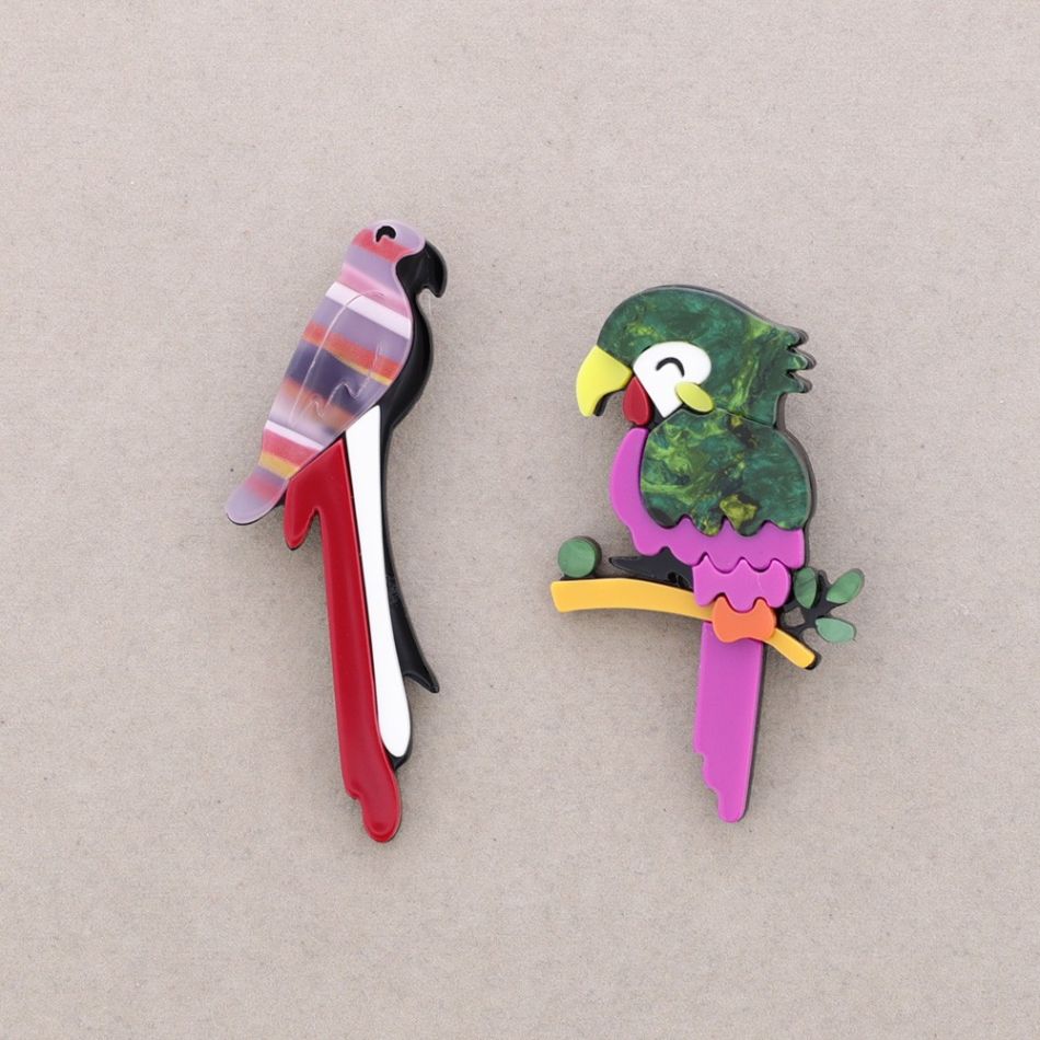 BROOCH SET TWO TROPICAL RESIN BIRDS