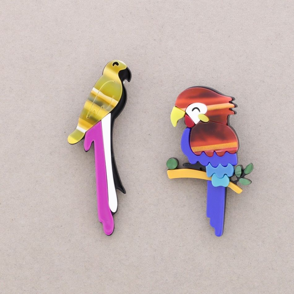 BROOCH SET TWO TROPICAL RESIN BIRDS
