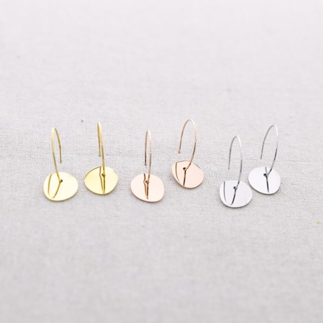 STEEL HOOP MEDAL EARRINGS