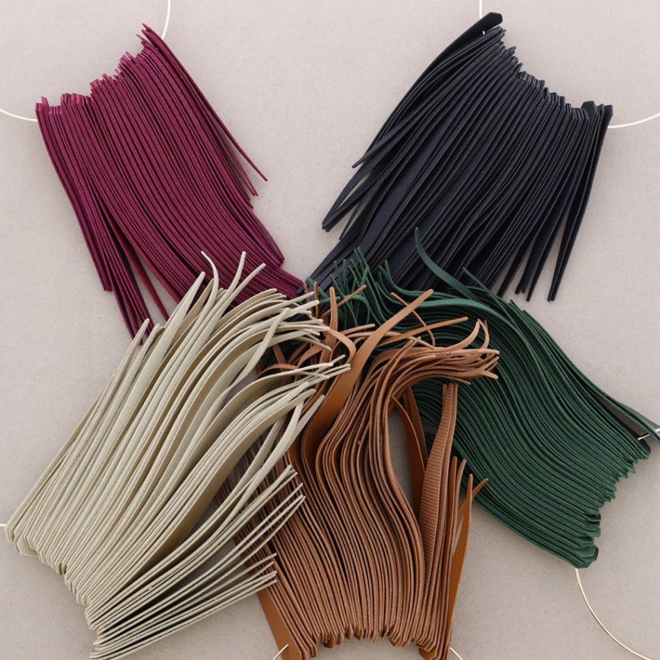 PENDANT NECKLACE WITH FRINGES IN FAUX LEATHER
