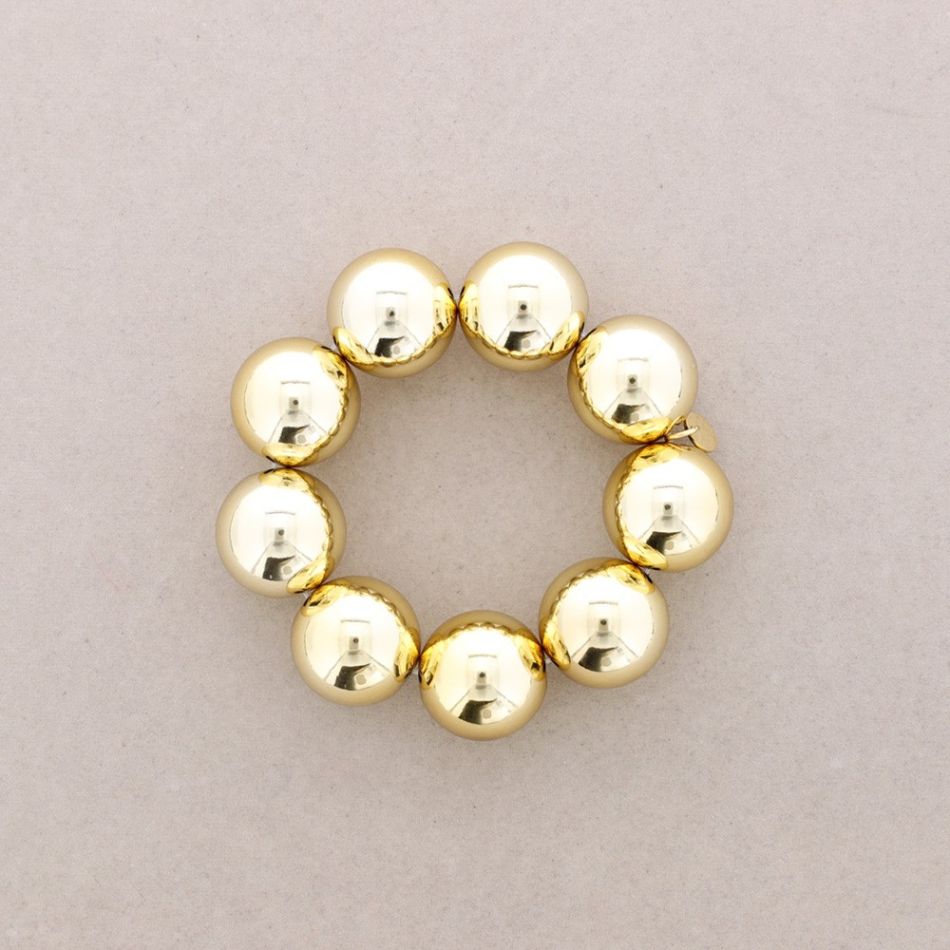 PULSERA ELÁSTICA BOLAS 25MM ACABADO METAL