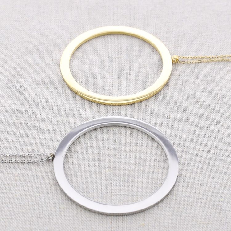 LONG STEEL NECKLACE WITH RING PENDANT 2