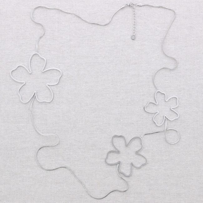 COLLAR LARGO ACERO FLORES HUECAS