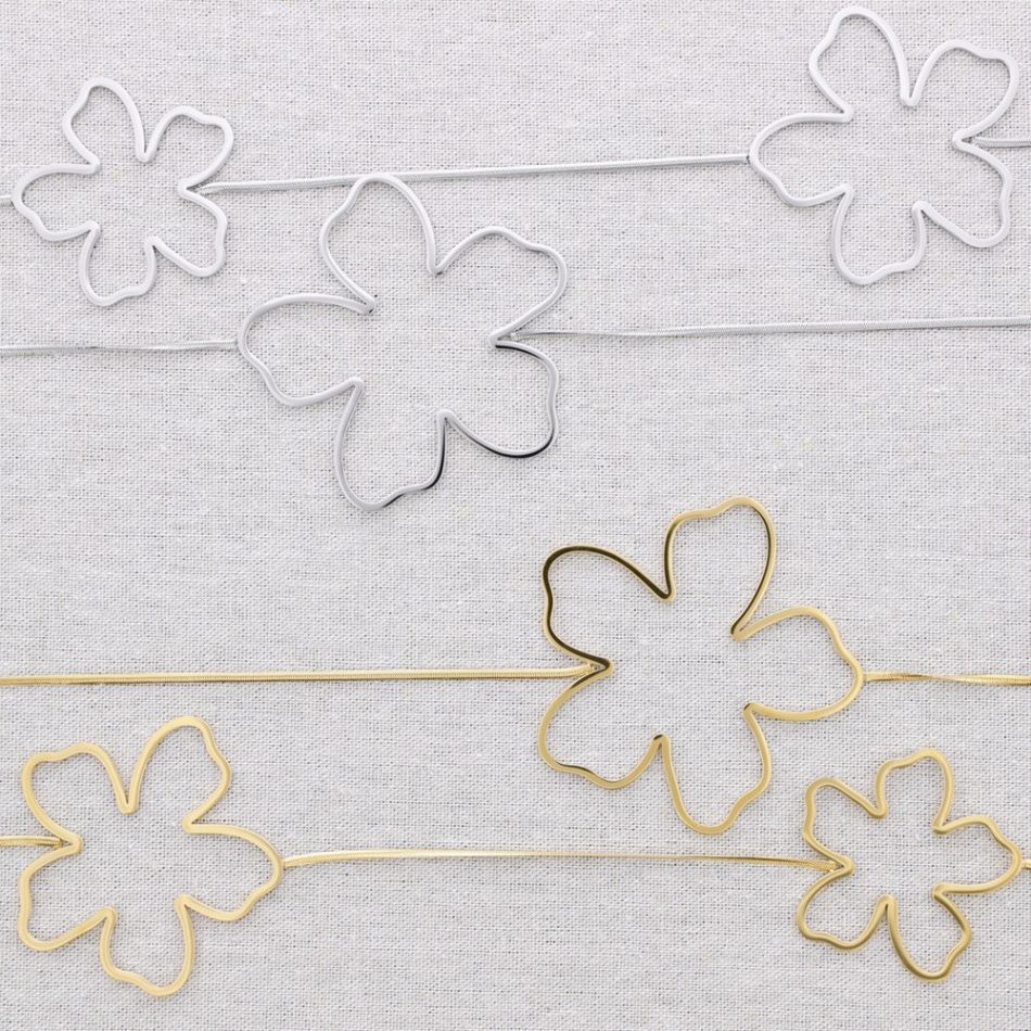 COLLAR LARGO ACERO FLORES HUECAS