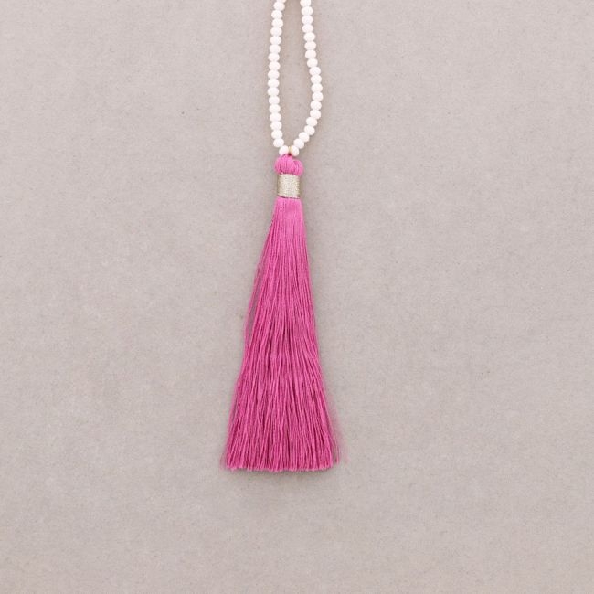 LONG NECKLACE WITH FACETED BEADS PENDANT. FRINGE