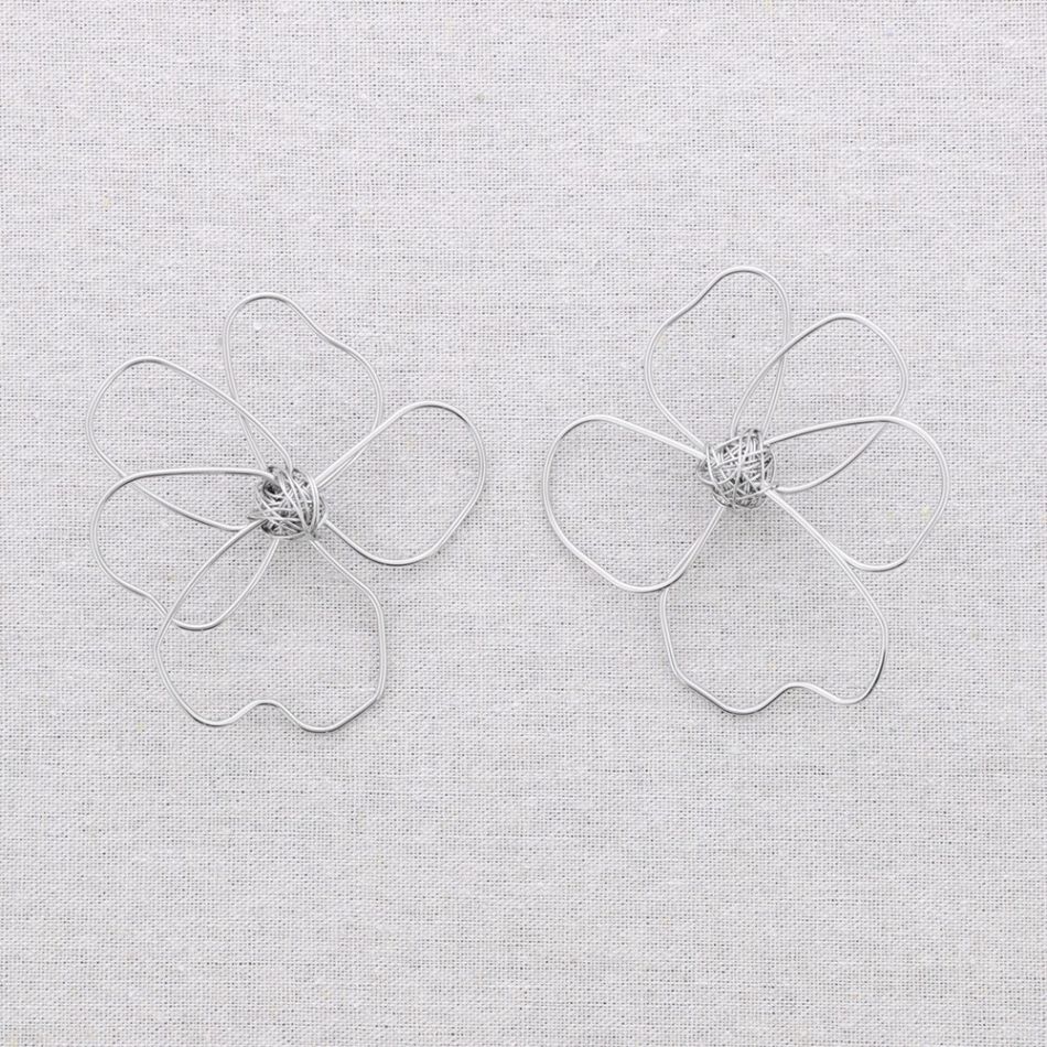 STEEL HOLLOW FLOWER EARRINGS