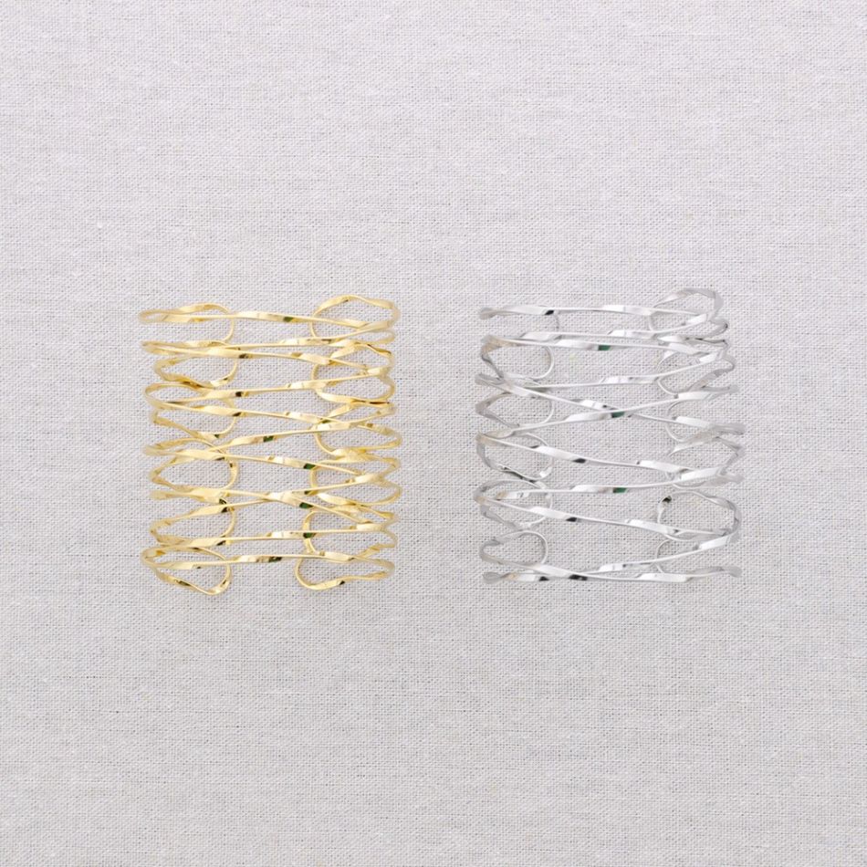 ADJUSTABLE STEEL BRACELET INTERLACTED STRIPS