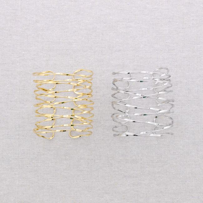 PULSERA ACERO AJUSTABLE TIRAS ENTRELAZADAS