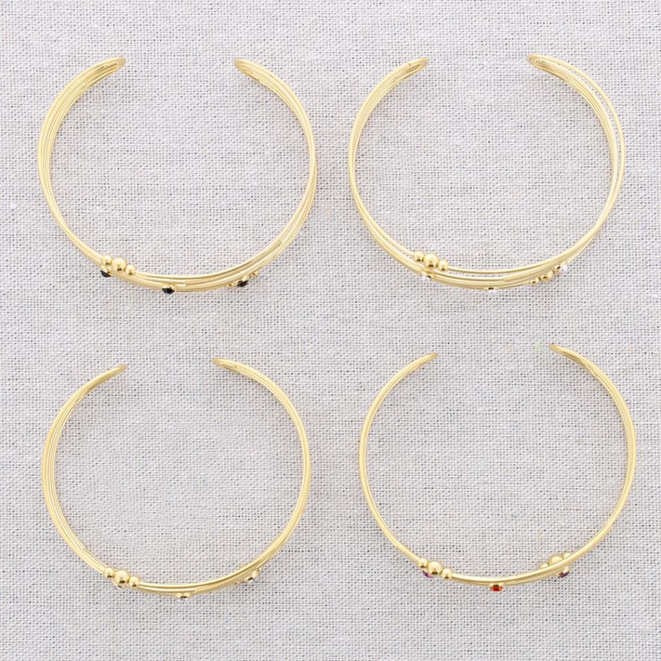 STEEL BRACELET WITH VARIOUS BEAD STRIPS