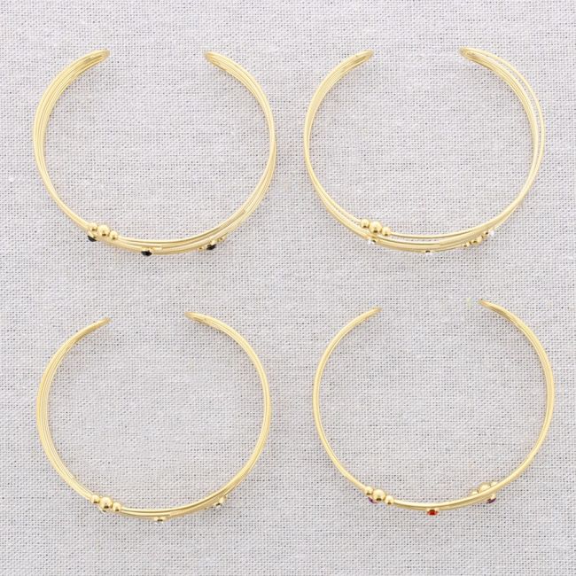 STEEL BRACELET WITH VARIOUS BEAD STRIPS
