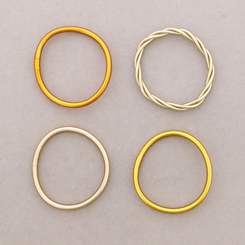 PULSERA SET 4 PIEZAS IMITACIÓN PAN DE ORO