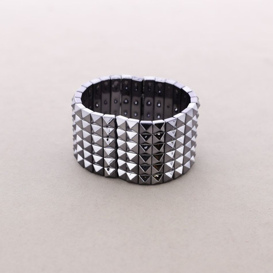 PULSERA TIRAS REMACHES