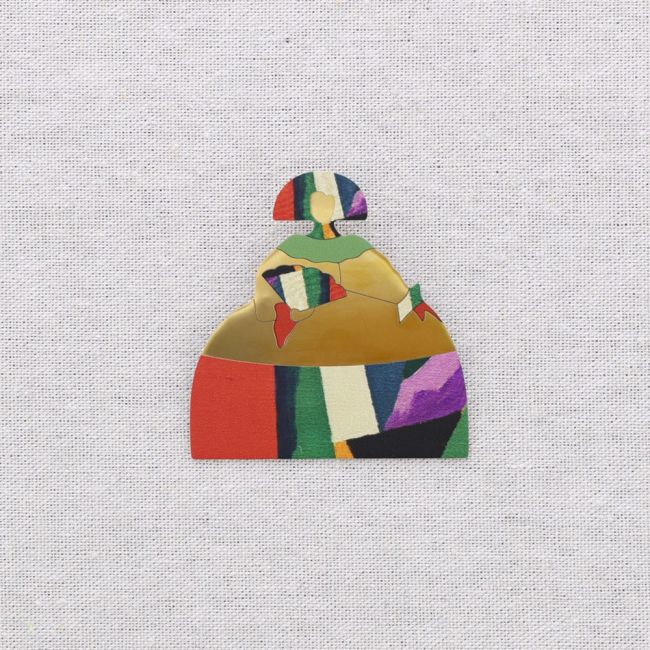 BROCHE ACERO MENINA DIBUJO