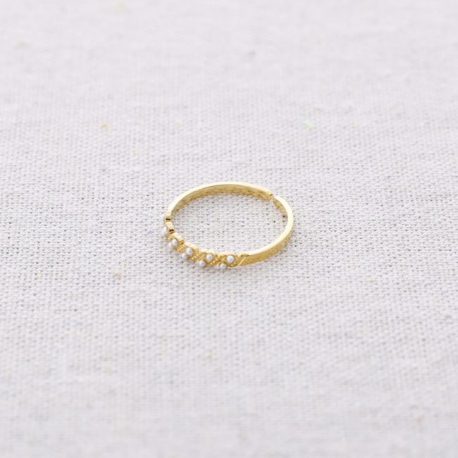 STEEL RING WITH PEARLS