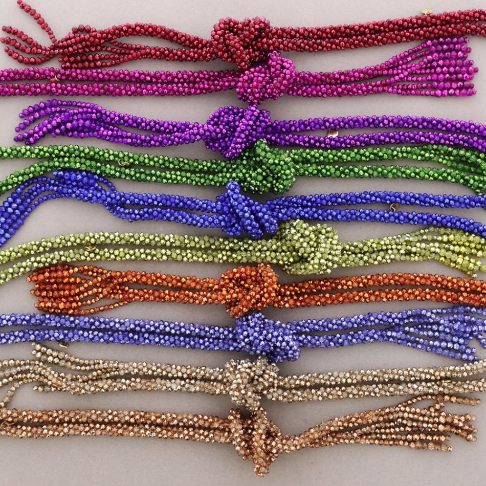 COLLAR LARGO NUDO BOLITAS CRISTALES