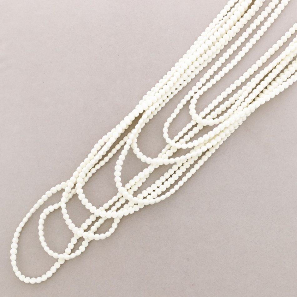 LONG NECKLACE WITH MULTI-TURN WOOL BALLS