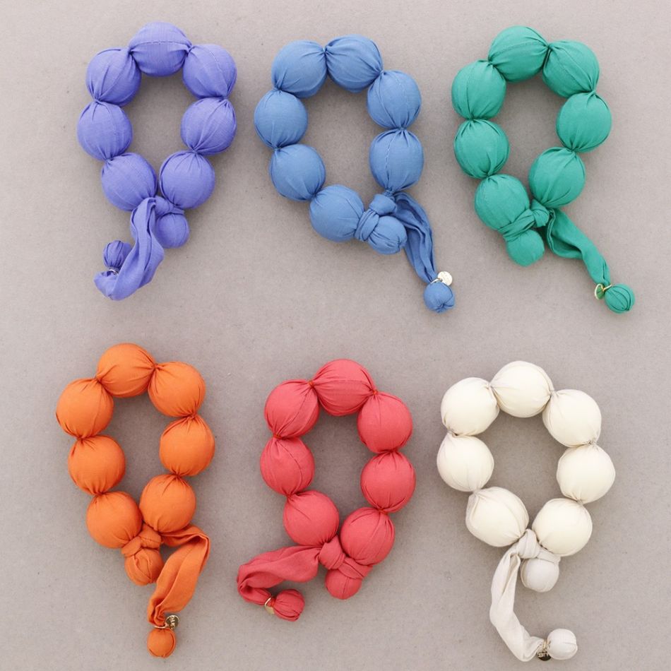 PULSERA BOLAS REVESTIDAS