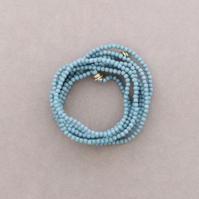 ADJUSTABLE 8-STRAND BRACELET WITH RESIN BEADS