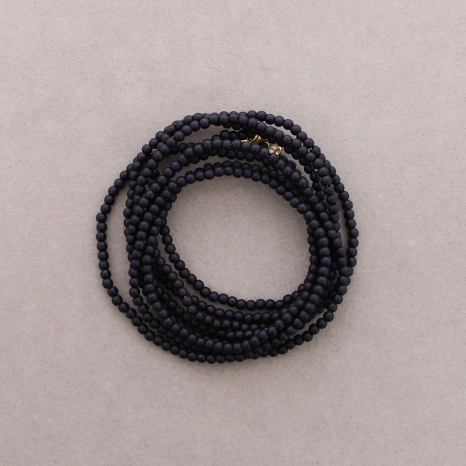 ADJUSTABLE 8-STRAND BRACELET WITH RESIN BEADS