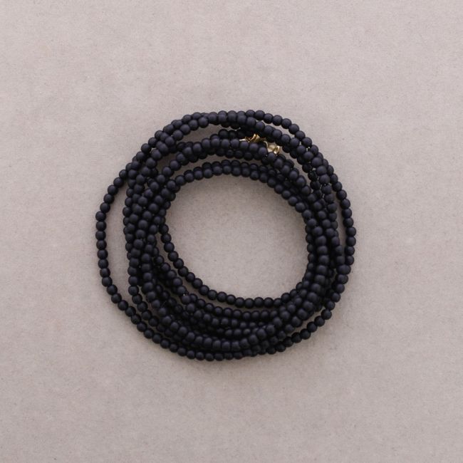 ADJUSTABLE 8-STRAND BRACELET WITH RESIN BEADS