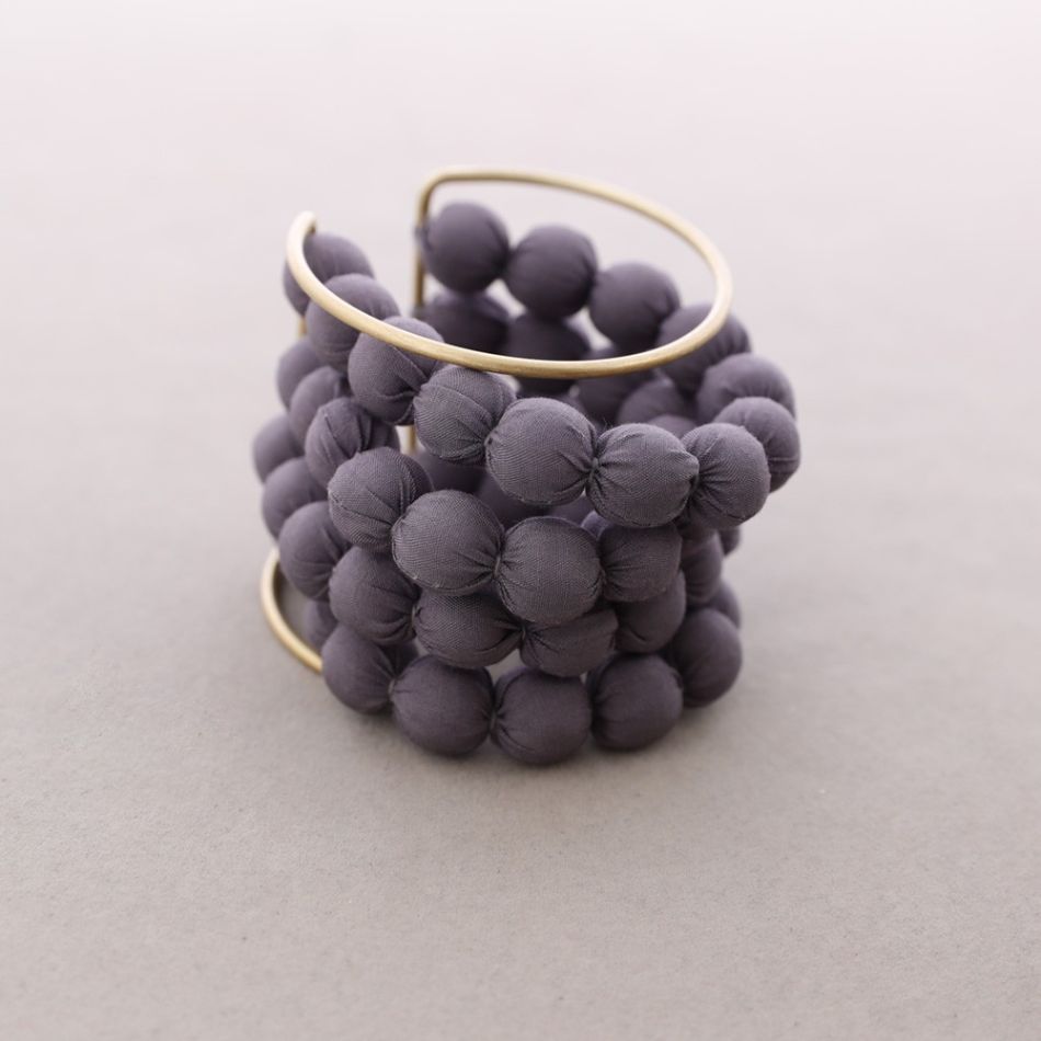 ADJUSTABLE BRACELET WITH COATED BALLS